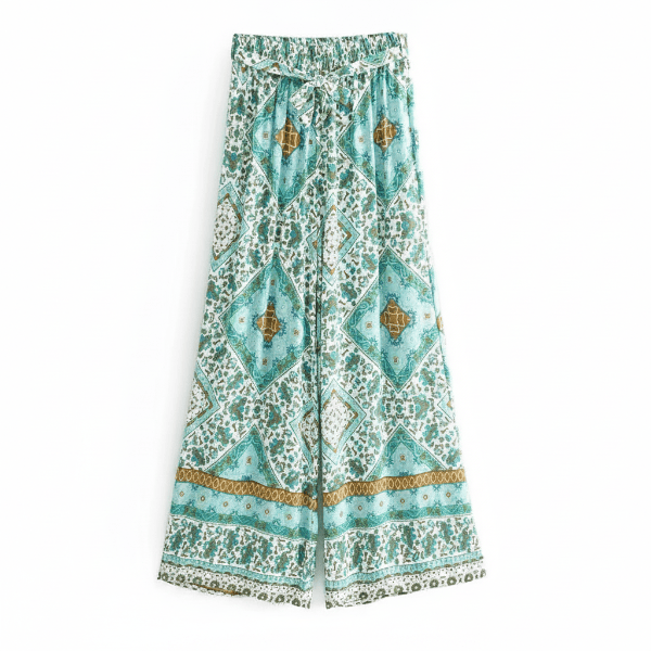 Turquoise mosaic boho wide leg pants with functional side pockets, a high waist drawstring waistband, lightweight rayon fabric, and a flowy palazzo silhouette.
