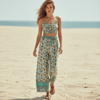 Boho Turquoise Floral Print Crop Top & Wide Leg Pants Set for women featuring a smocked spaghetti strap crop top, high-waisted drawstring wide leg pants, and turquoise floral boho print.