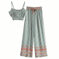 View of dusty teal floral boho wide leg pants and crop top matching outfit