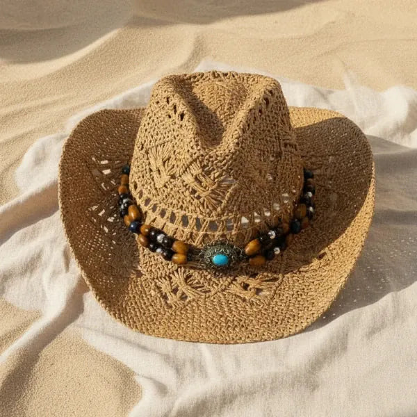 Beaded straw cowgirl hat with turquoise-colored beads and boho western woven cowboy design