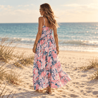 Back of pink boho floral maxi dress with spaghetti straps, V-neck, empire waist and long flowy A-line skirt