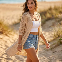 Champagne long knit cardigan for women with an open front, lightweight fabric, and loose bohemian silhouette.