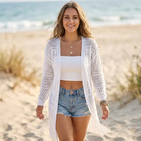 White lightweight long cardigan for women featuring an airy open-knit pattern and relaxed summer style.
