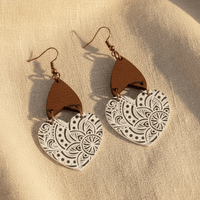 Boho wooden heart earrings with engraved layered wood, lightweight acrylic accents, and antique copper fishhook ear wires.