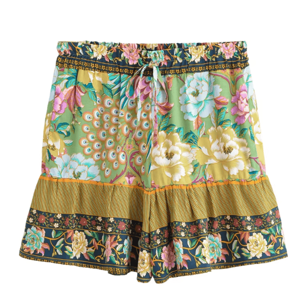 Green boho floral high waist drawstring shorts with pockets in breathable cotton rayon featuring a colorful peacock-inspired print for resort wear and beach outfits.