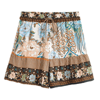 Blue boho floral high waist drawstring shorts with pockets made from lightweight cotton rayon featuring a peacock-inspired floral print for summer styles, beach outfits, and casual bohemian style.