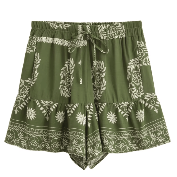 Olive Grove green boho floral high waist drawstring shorts with pockets in breathable cotton rayon featuring a botanical print and ruffle hem for summer vacations, beach days, and casual bohemian outfits.